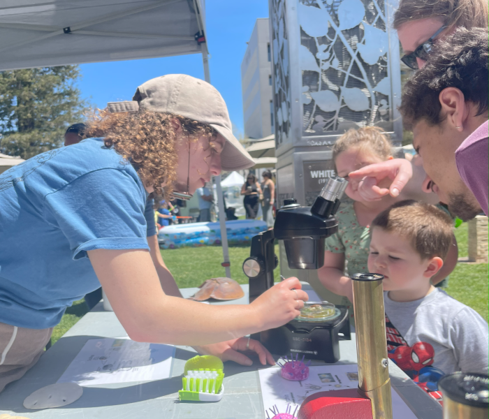 Grad students at outreach event